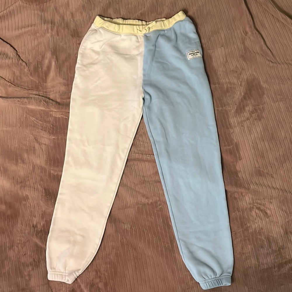 This is a warm sweatpant from Abercrombie kids. It is two-toned, blue and white.